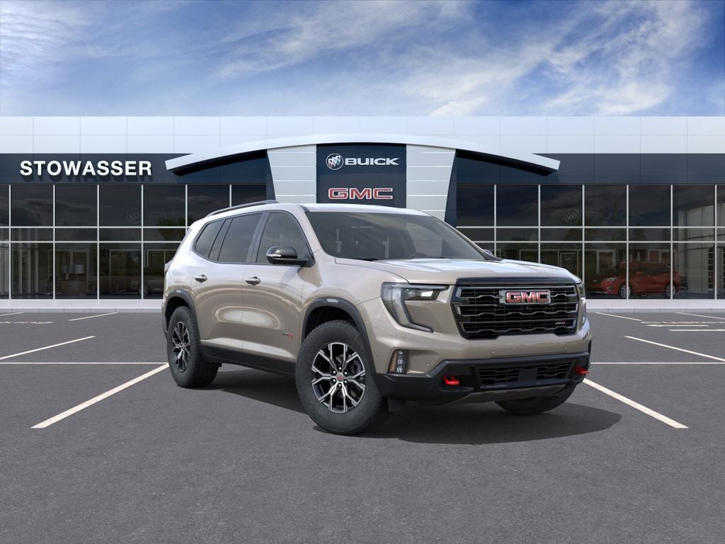 2026 GMC Acadia AT4 in Riverstone Metallic — front three-quarter view