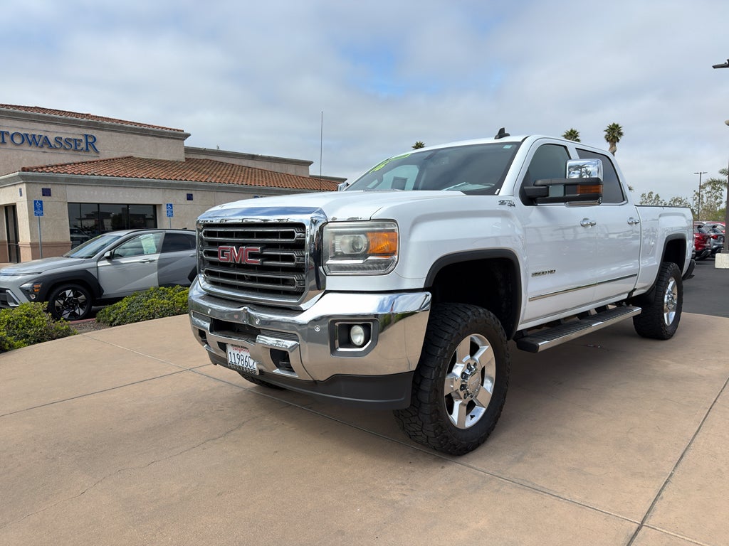 2016 GMC Sierra 2500 HD Crew Cab Standard Box 4-Wheel Drive SLT in Summit White — front three-quarter view