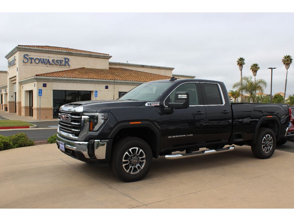 2025 GMC Sierra 2500 HD SLE in Titanium Rush Metallic — front three-quarter view