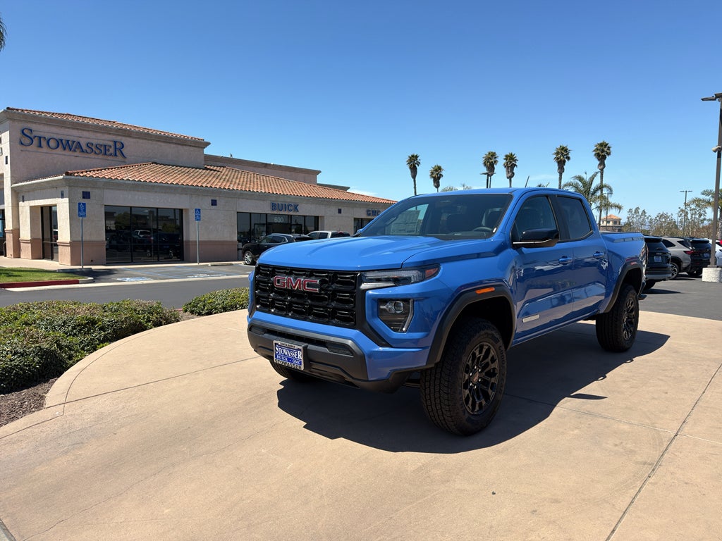2026 GMC Canyon Elevation in Rapids Metallic — front three-quarter view
