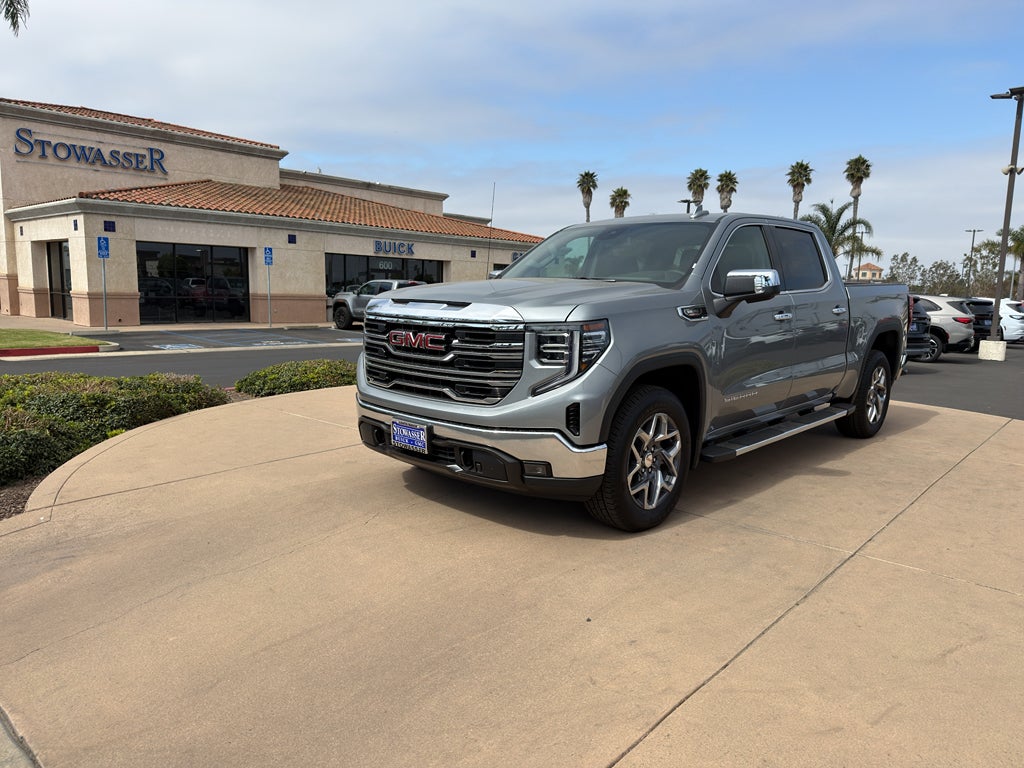 2026 GMC Sierra 1500 SLT in Sterling Metallic — front three-quarter view