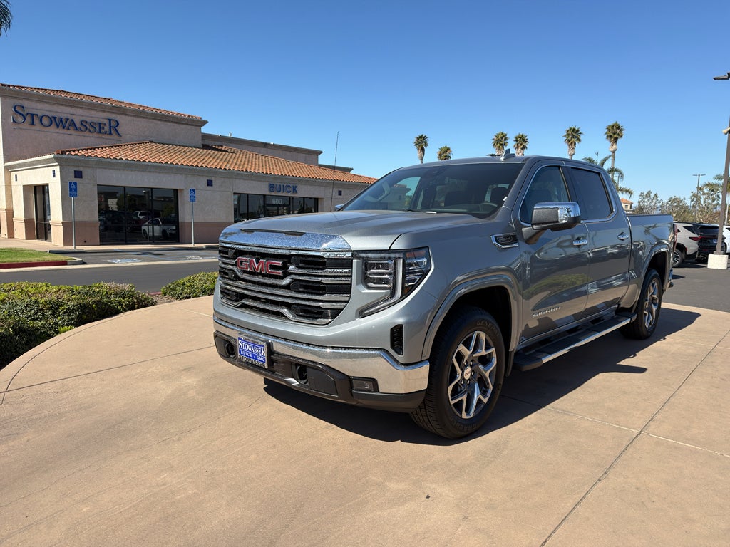 2026 GMC Sierra 1500 SLT in Sterling Metallic — front three-quarter view