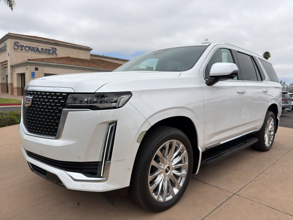 2023 Cadillac Escalade 4WD Premium Luxury in Crystal White Tricoat — front three-quarter view