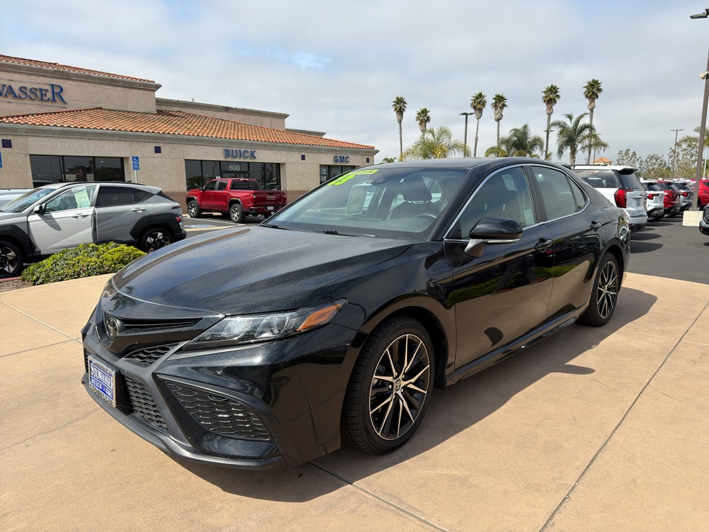 2023 Toyota Camry SE Auto (SE) in Black — front three-quarter view
