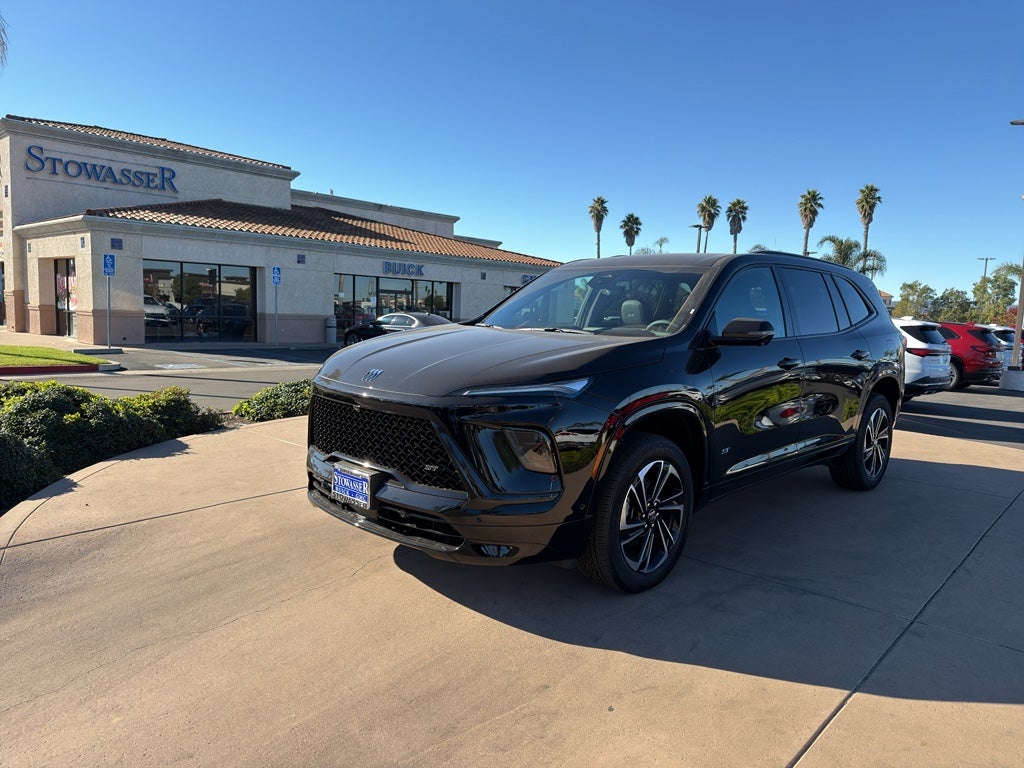 2026 Buick Enclave Sport Touring in Ebony Twilight Metallic — front three-quarter view