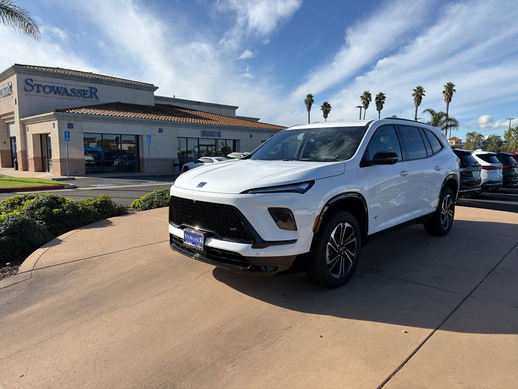 2026 Buick Enclave Sport Touring in Summit White — front three-quarter view