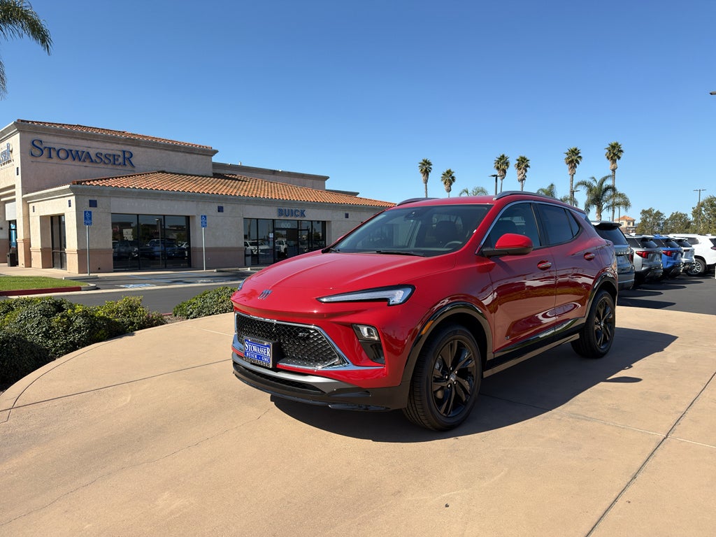 2026 Buick Encore GX Sport Touring in Brilliant Red — front three-quarter view